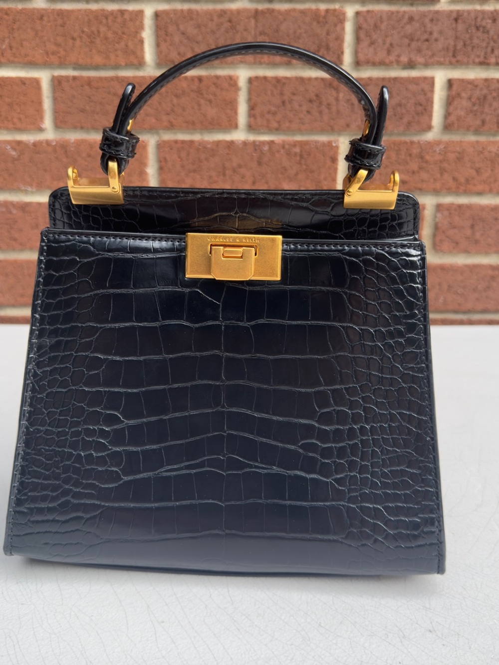Black Croc-Embossed Top Handle Bag with Gold Hardware body strap